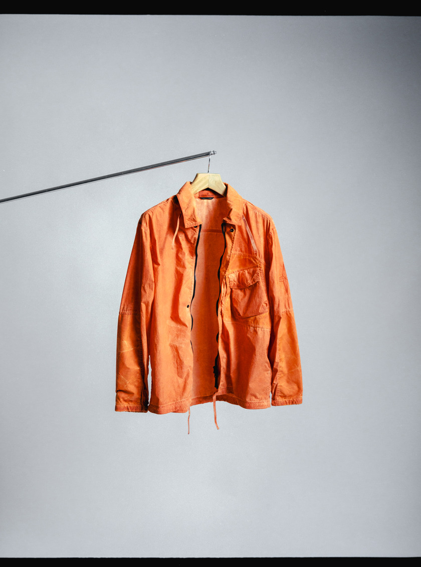 Analog photograph of a shirt on a hanger